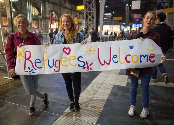 Girls welcome refugees